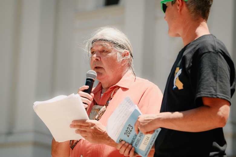 Gary Mulcahy, government liaison for the Winnemem Wintu Tribe, speaks during a rally that brought together tribal leaders, fishing advocates and environmental groups at the state capitol in Sacramento, California, this past July.