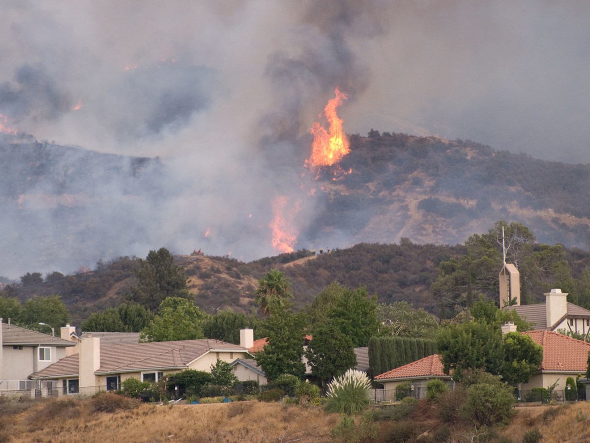 Homes in California’s wildland urban interface face the threat of a neaby wildfire.