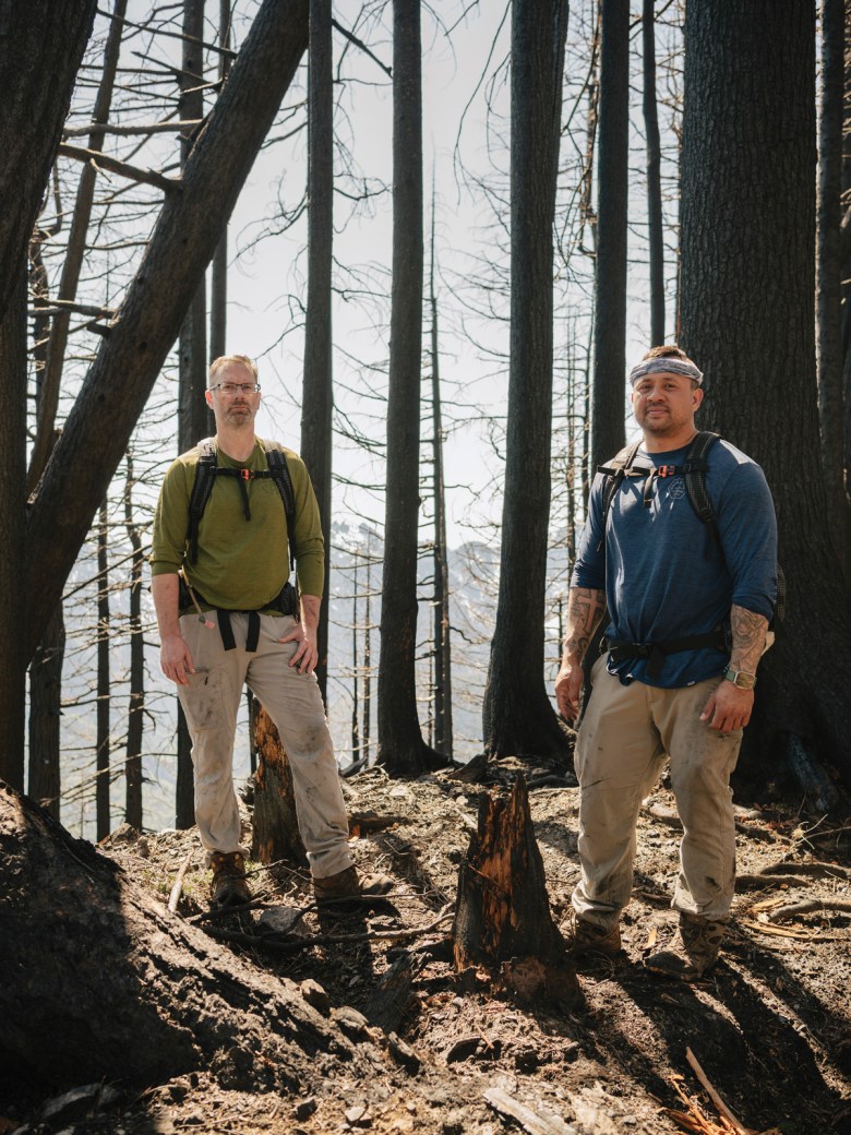 Matt Bishop, left, and Steve Cooper on the burned-over trail to Baring Mountain during their return in May.