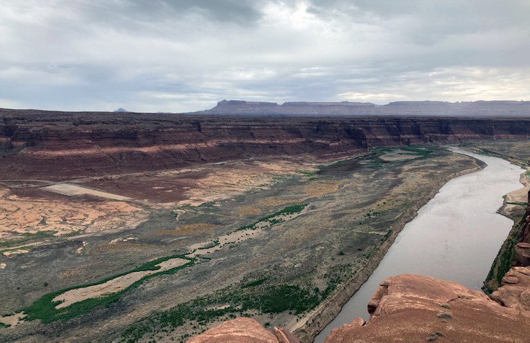 The Colorado River and the silt flats left behind by a receding Lake Powell. Note the old Hite Marina boat ramp on the left side of the image. This was once at water’s edge.