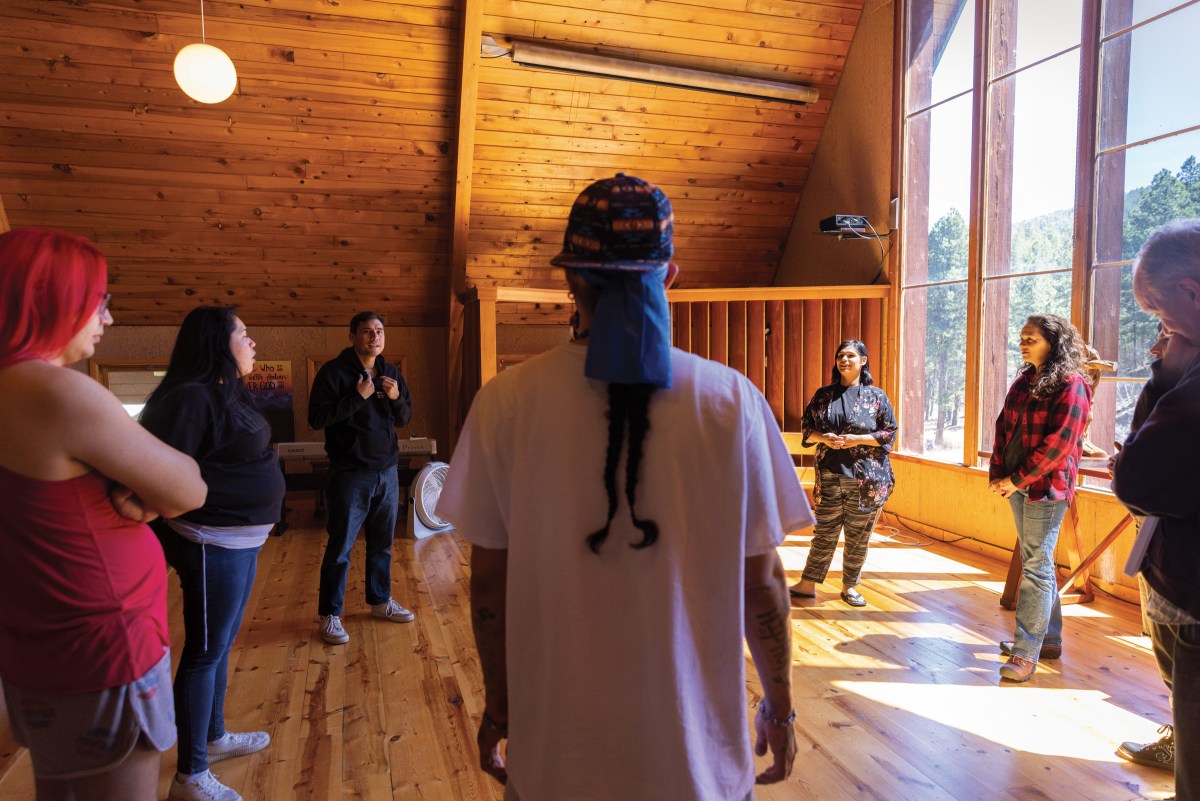 Cast members of Wicoun gather with Larissa FastHorse at the chapel  at Placerville Camp in the Black Hills of South Dakota.
