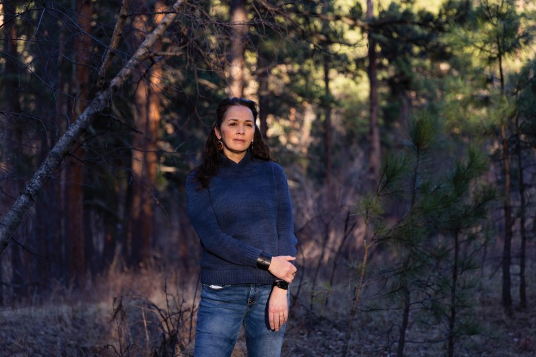 Larissa FastHorse poses for a portrait at Placerville Camp located in the Black Hills of South Dakota.