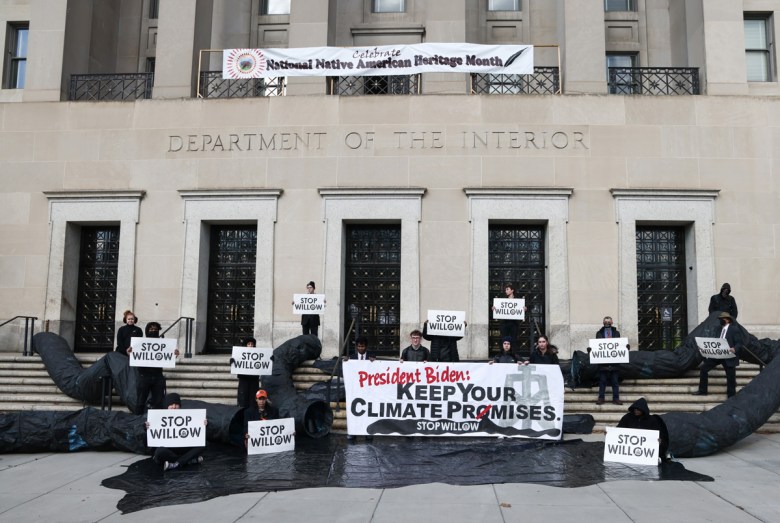 Climate activists hold a demonstration at the Department of Interior on November 17, 2022 in Washington, D.C., to urge President Biden to reject the Willow Project. This year, the administration approved ConocoPhillips’ massive decades-long Willow drilling project in Alaska.