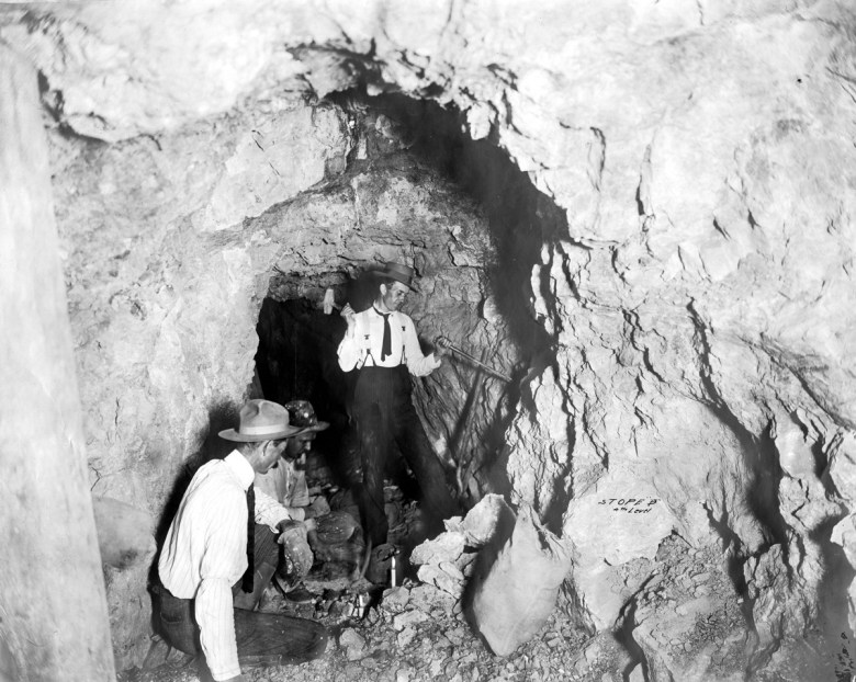 Three men in the Copper Canyon Co. Mine on Horseshoe Mesa in the Grand Canyon, 2,500 feet below the South Rim, circa 1907.
