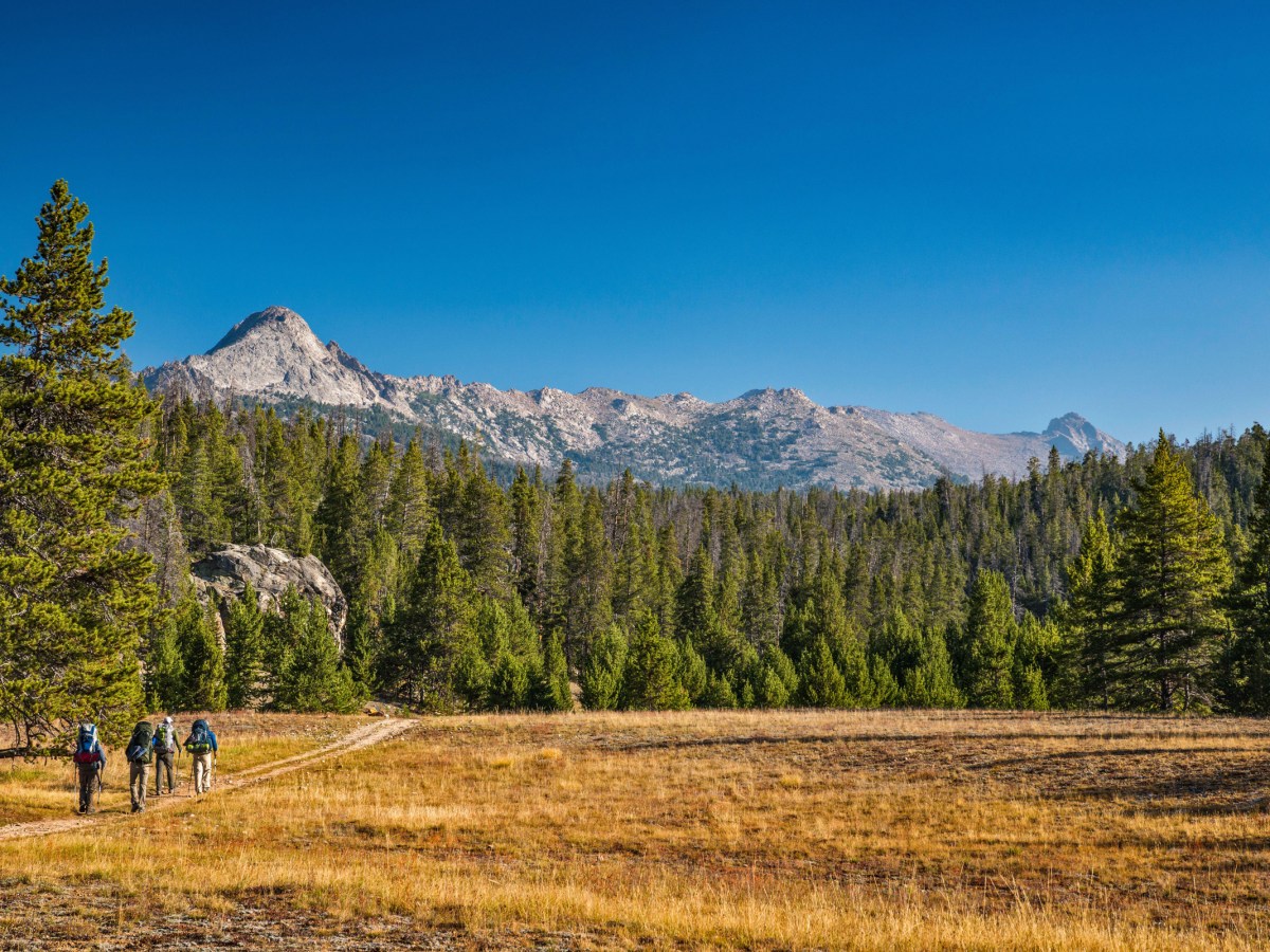 Hikers on Big Sandy Lake Trail in Bridger Teton National Forest, Wyoming.