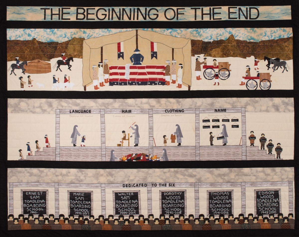 “The Beginning of the End” is a quilt by Diné quiltmaker, Susan Hudson, which speaks to the legacy of Indian boarding schools in the United States and Canada (where they are known as “residential schools”).