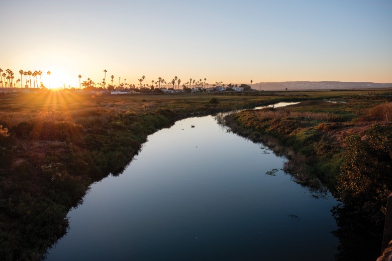 The sun rises over the Tijuana Estuary in November.