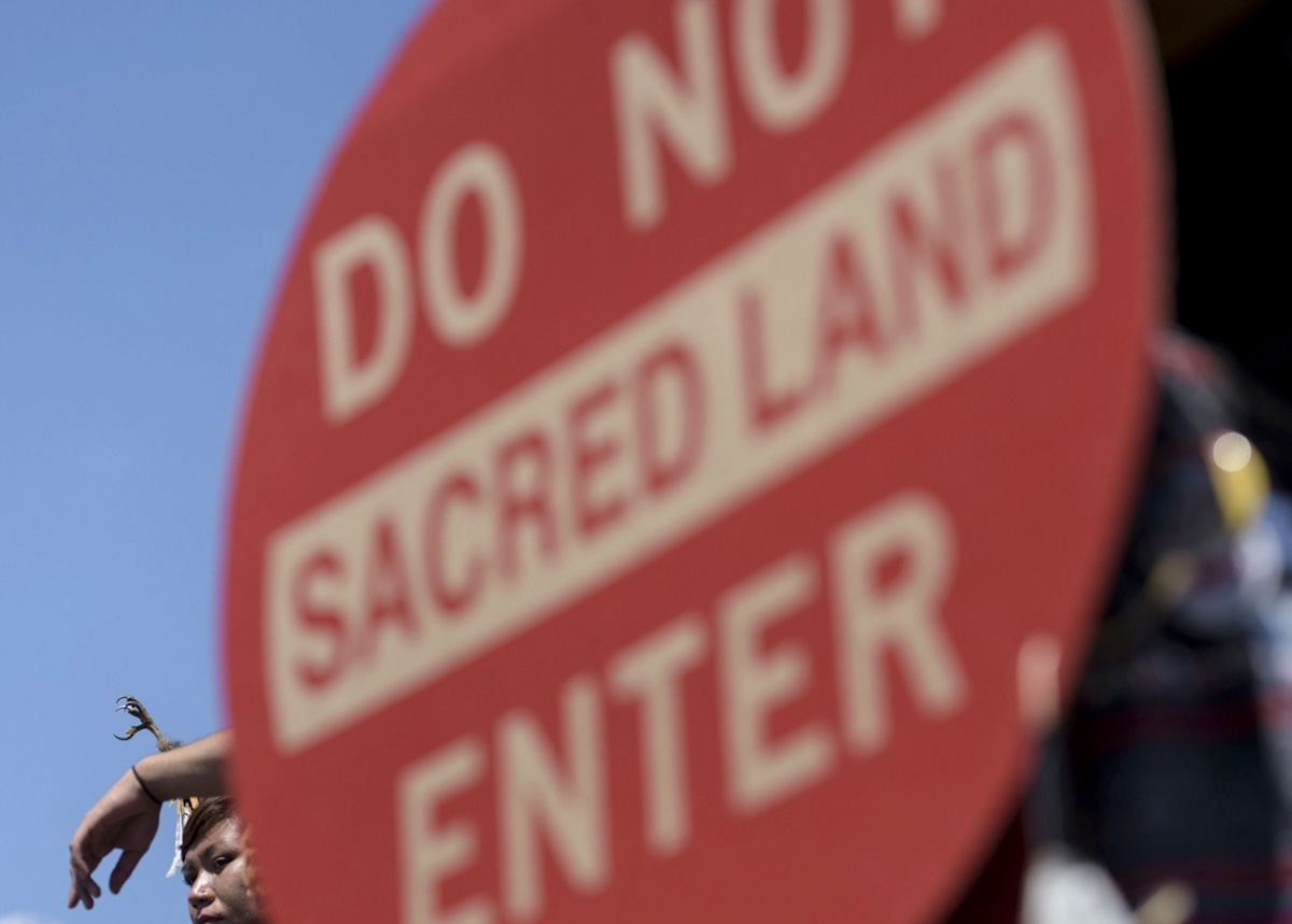 Members of the San Carlos Apache Nation and other activists gathered In Washington, D.C., in July 2015 to protest a section of the National Defense Authorization Act that would turn over parts of Oak Flat to a foreign copper mining company.