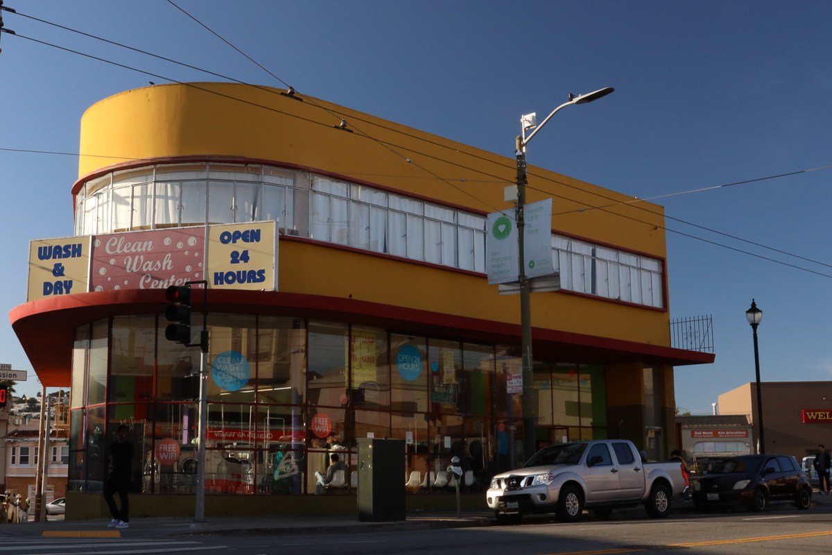 Clean Wash Center and sideshow remnants at golden hour, Excelsior, March 26, 2020.