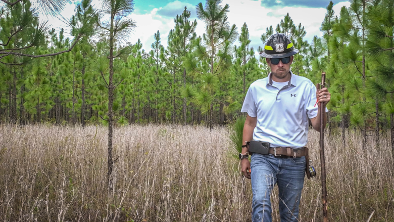  Forest Technician Jacob Floyd studies Longleaf Pine on Palustris Experimental Forest, part of the Kisatchie National Forest in Louisiana in October 2023. The U.S. Forest Service manages 173 million acres of land and is proposing that some land under its forests be used to store carbon captured from industries to prevent it from being released into the atmosphere. 